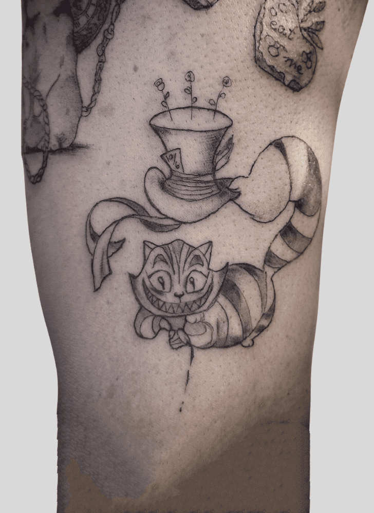 Alice In Wonderland Tattoo Snapshot