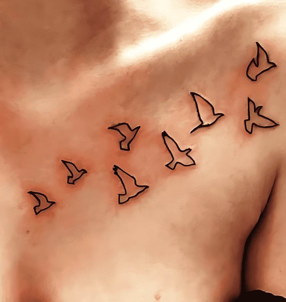 Bird Flying Tattoo Shot