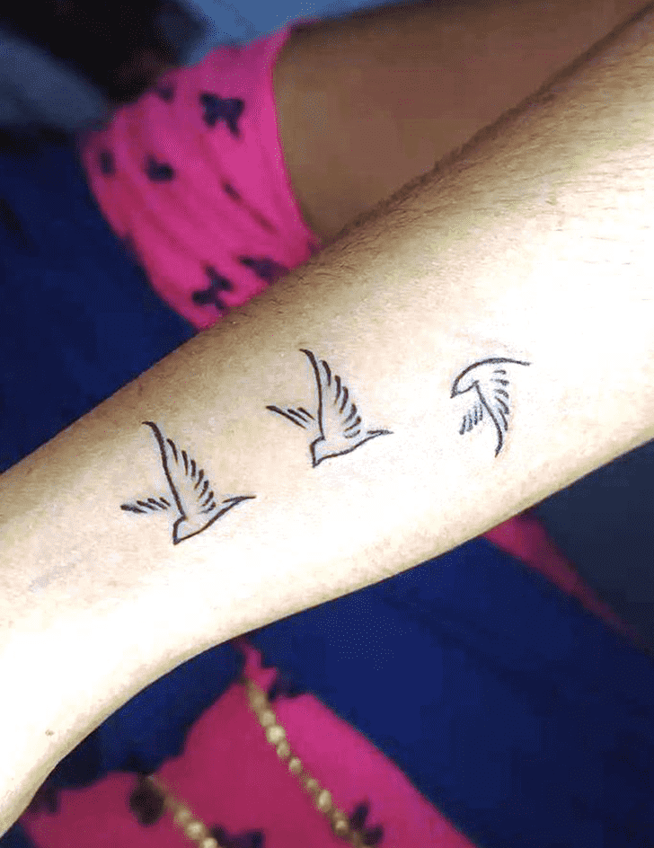 Small Bird Tattoo Photo