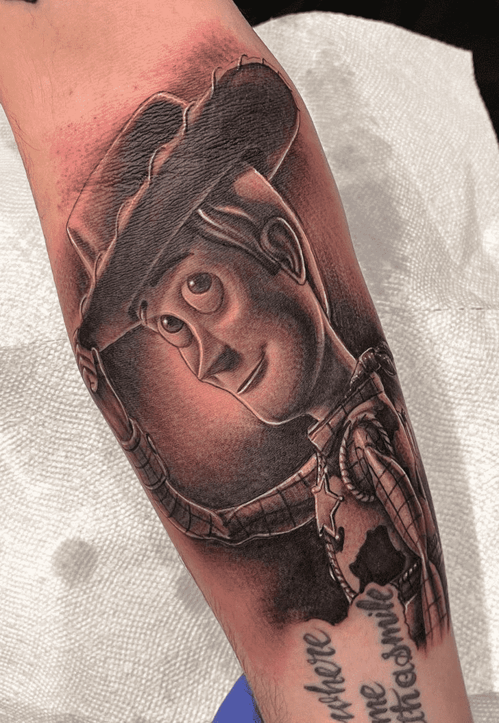 Woody Tattoo Design Image